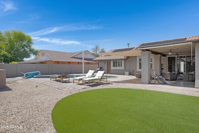 1231 E Sunburst Ln, Tempe, AZ 85284 - view of yard with ceiling fan, a patio area, and an outdoor hangout area