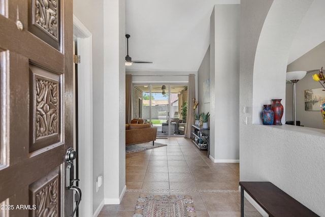 1231 E Sunburst Ln, Tempe, AZ 85284 - entrance foyer featuring a ceiling fan, light tile patterned floors, and baseboards