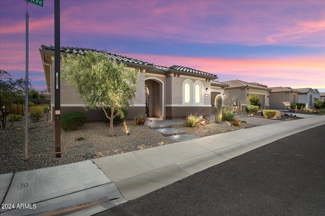 view of mediterranean / spanish house