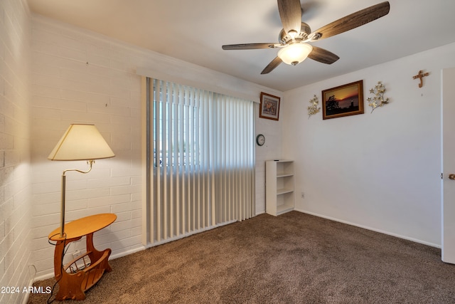 unfurnished room with carpet floors and ceiling fan