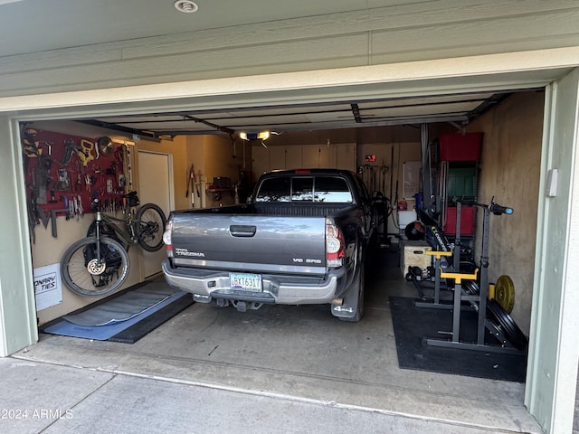 garage featuring a garage door opener