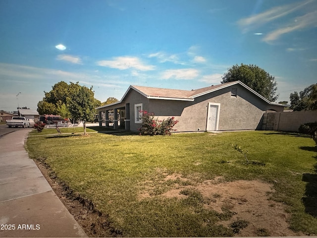 6111 N 64th Dr, Glendale, AZ 85301 - view of side of property featuring stucco siding