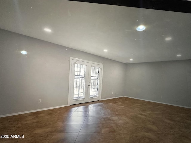 6111 N 64th Dr, Glendale, AZ 85301 - unfurnished room featuring french doors, recessed lighting, and baseboards