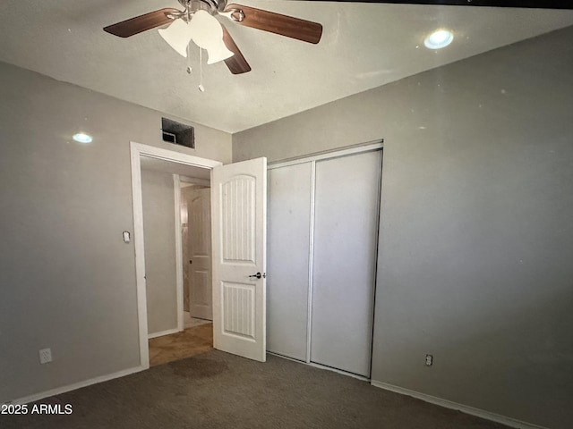 6111 N 64th Dr, Glendale, AZ 85301 - unfurnished bedroom with carpet, a closet, a ceiling fan, and baseboards