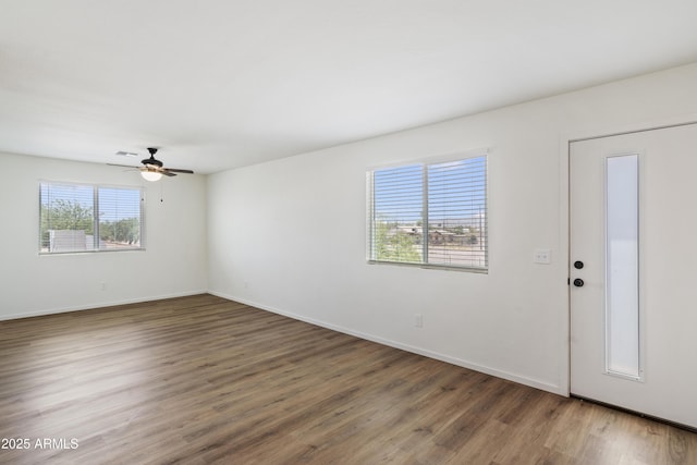 entrance foyer featuring dark hardwood / wood-style floors and ceiling fan