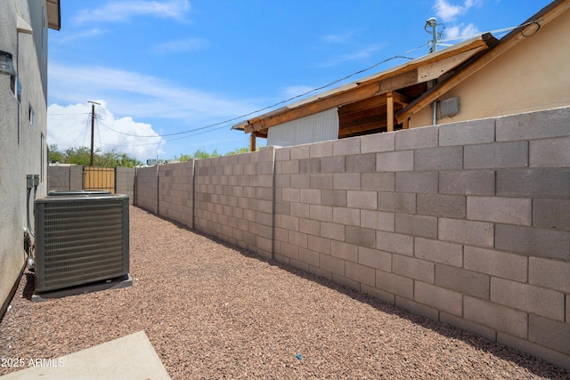 view of yard featuring central AC