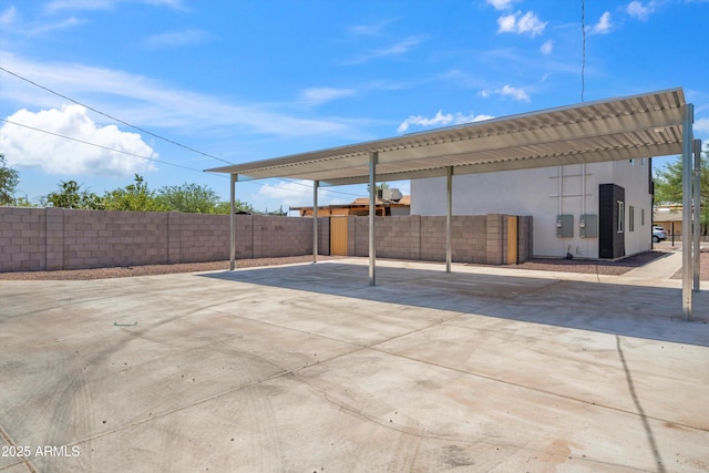 view of patio / terrace with a carport