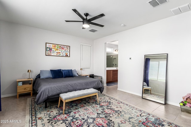 7910 S 33rd Ln, Laveen, AZ 85339 - bedroom featuring tile patterned flooring, ensuite bath, and ceiling fan