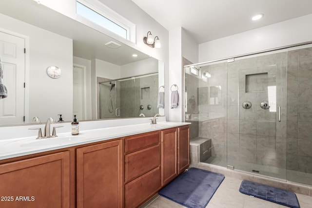 7910 S 33rd Ln, Laveen, AZ 85339 - bathroom featuring double vanity, a stall shower, and tile patterned flooring