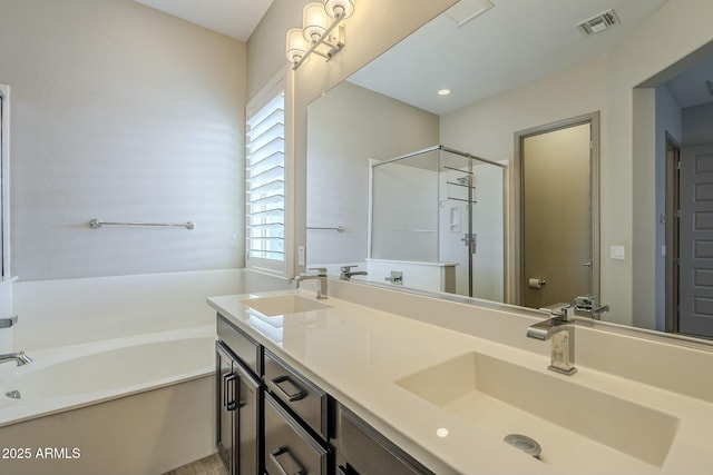 bathroom featuring vanity and plus walk in shower