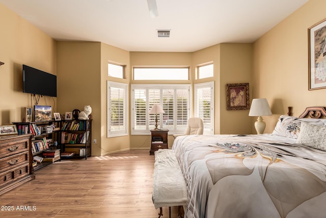 bedroom with light wood-type flooring