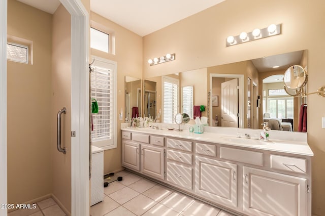 bathroom featuring tile patterned floors and vanity