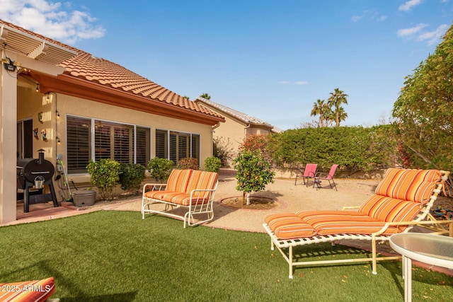 exterior space featuring a patio and a lawn