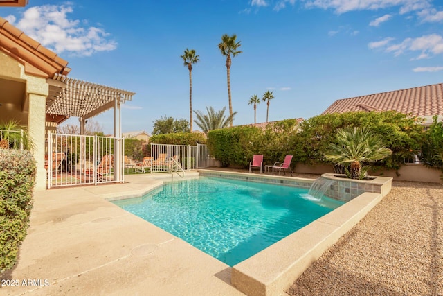 view of pool with pool water feature, a patio area, and a pergola