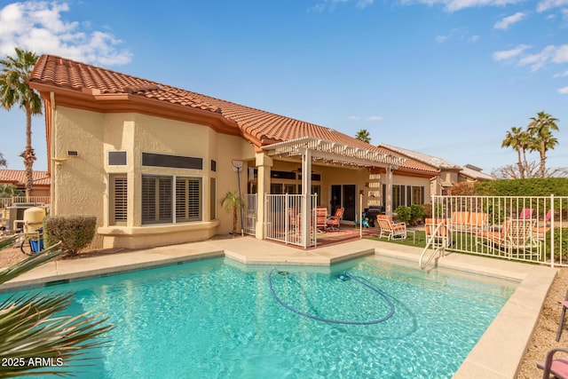 back of house with a fenced in pool, central AC unit, a patio area, and a pergola