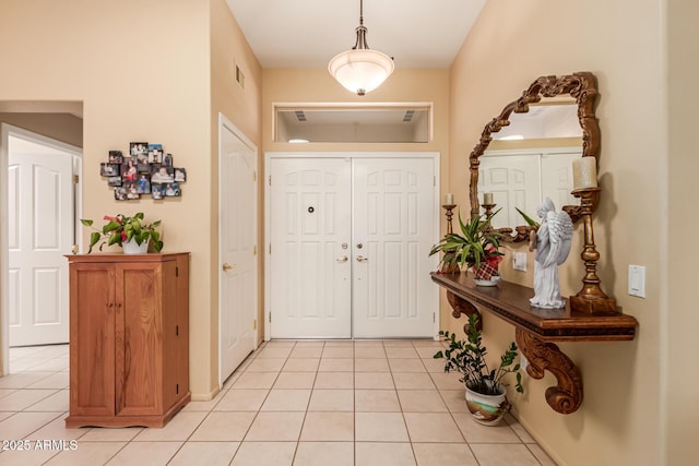 view of tiled entrance foyer