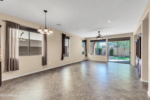 spare room with visible vents, baseboards, tile patterned flooring, ceiling fan with notable chandelier, and recessed lighting