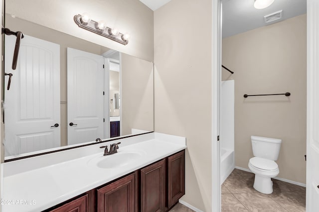 bathroom with bathing tub / shower combination, visible vents, toilet, vanity, and tile patterned floors