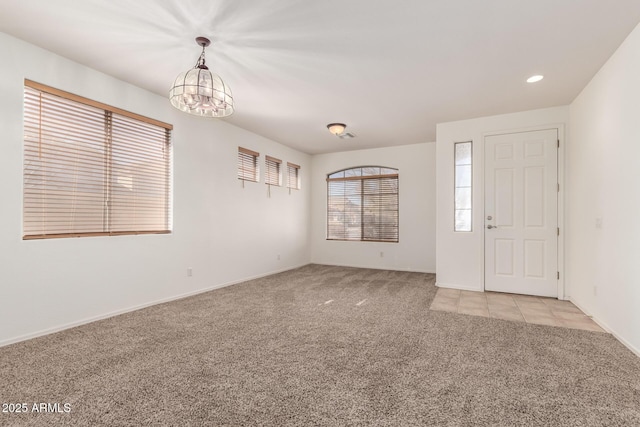 foyer with light carpet