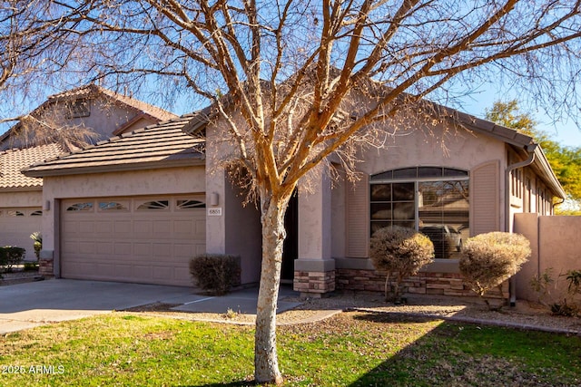 view of front of property featuring a garage