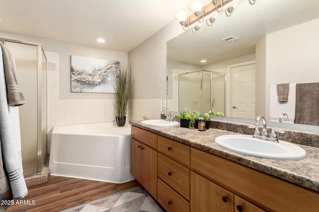 14250 W Wigwam Blvd Unit 812, Litchfield Park, AZ 85340 - bathroom with a sink, a shower stall, double vanity, and a garden tub