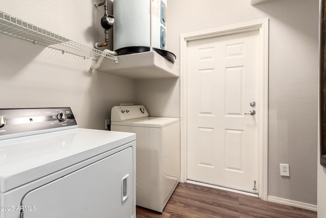 14250 W Wigwam Blvd Unit 812, Litchfield Park, AZ 85340 - clothes washing area with washer and dryer, laundry area, and dark wood-style floors