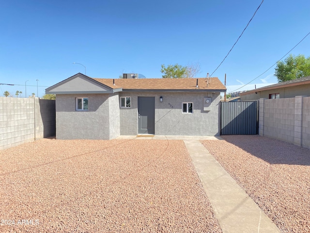 rear view of property with a patio area