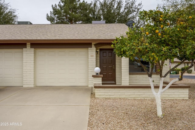 ranch-style home with a garage