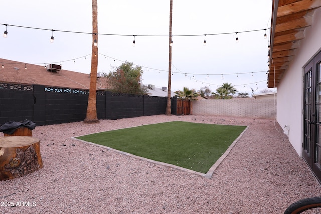 view of yard featuring central AC unit