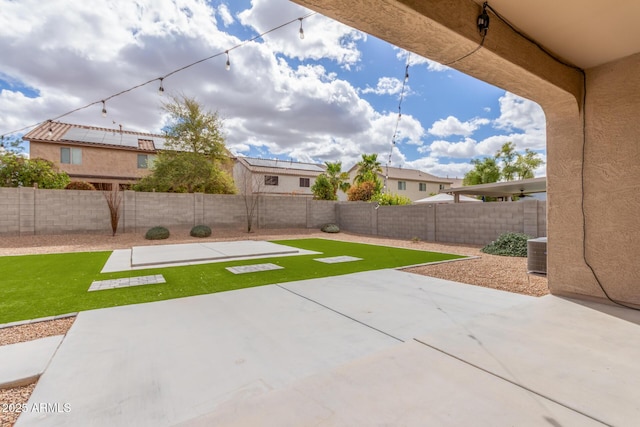 view of patio featuring central AC unit and a fenced backyard