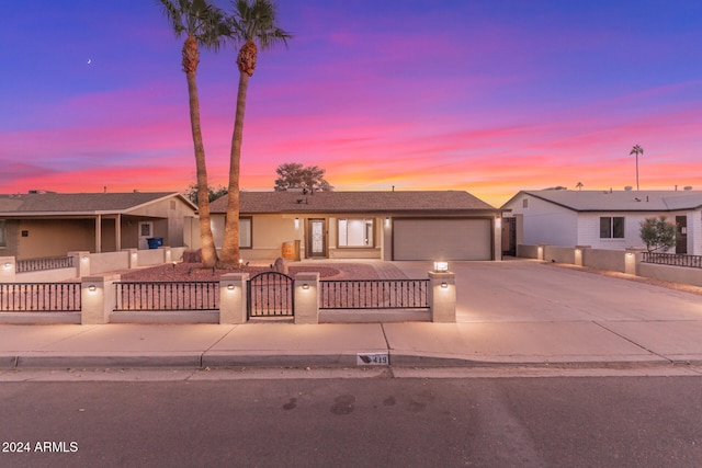 single story home featuring a garage