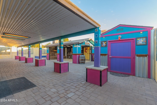 view of patio with a bar