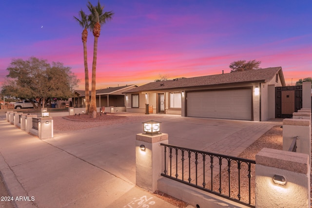 view of front of property featuring a garage