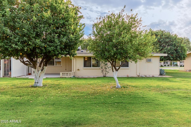 view of front of house with a front lawn