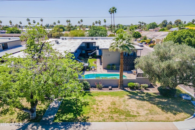 birds eye view of property with a residential view