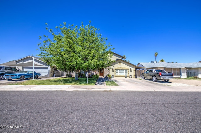 4112 E Maldonado Dr, Phoenix, AZ 85042 - view of front of property with concrete driveway and a garage