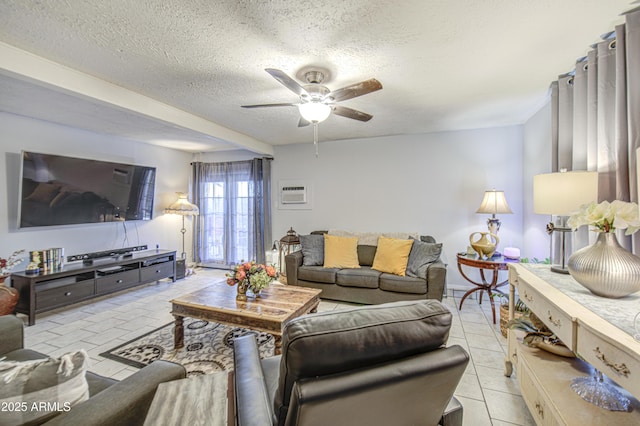 4112 E Maldonado Dr, Phoenix, AZ 85042 - living area with an AC wall unit, a textured ceiling, and ceiling fan