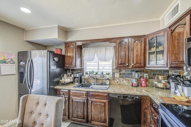 4112 E Maldonado Dr, Phoenix, AZ 85042 - kitchen with ornamental molding, visible vents, dishwasher, light countertops, and a sink
