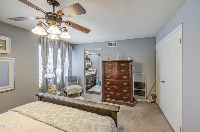 4112 E Maldonado Dr, Phoenix, AZ 85042 - carpeted bedroom with a closet, ceiling fan, and visible vents