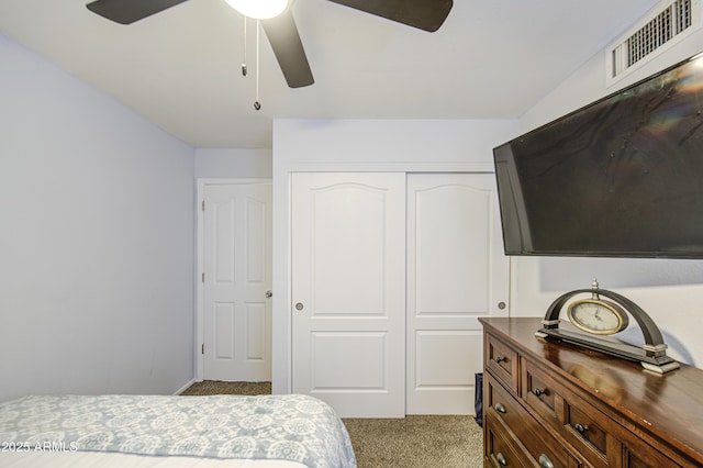 4112 E Maldonado Dr, Phoenix, AZ 85042 - bedroom with visible vents, ceiling fan, a closet, and carpet floors
