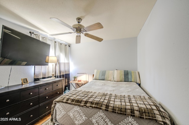 4112 E Maldonado Dr, Phoenix, AZ 85042 - bedroom with a ceiling fan and wood finished floors