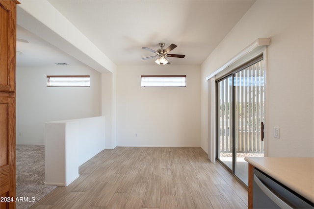 interior space with light hardwood / wood-style floors and ceiling fan