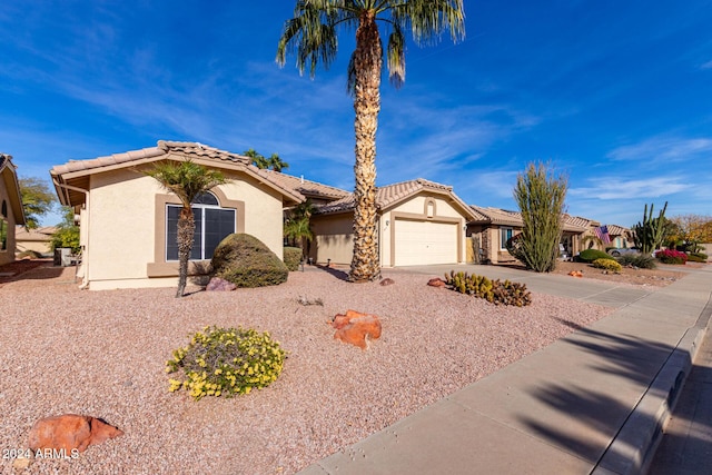 view of front of property featuring a garage