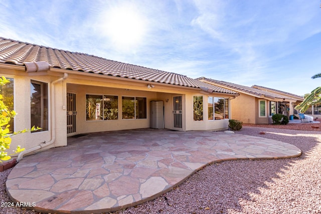 rear view of house with a patio area