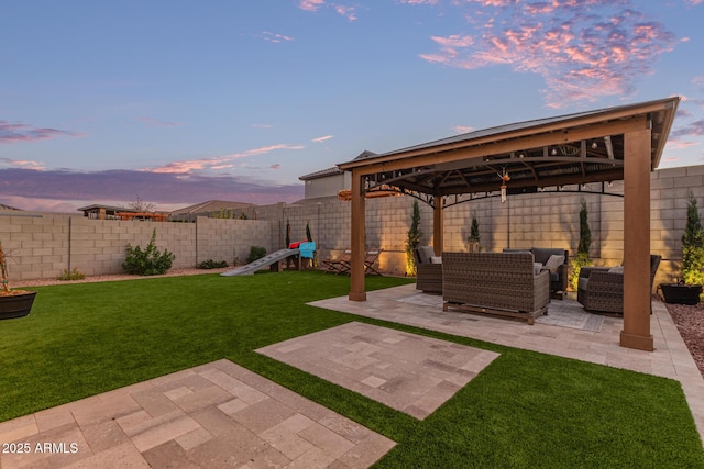 view of yard with a patio area, a fenced backyard, outdoor lounge area, and a gazebo