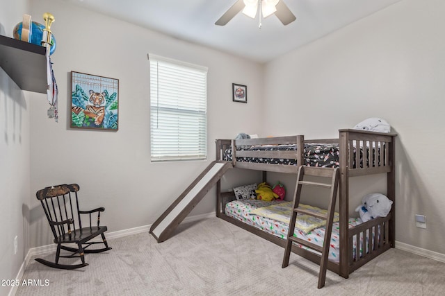 carpeted bedroom with baseboards