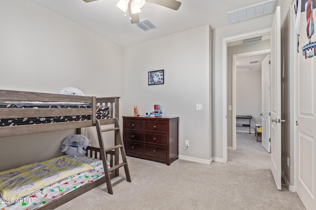 bedroom with light carpet and visible vents