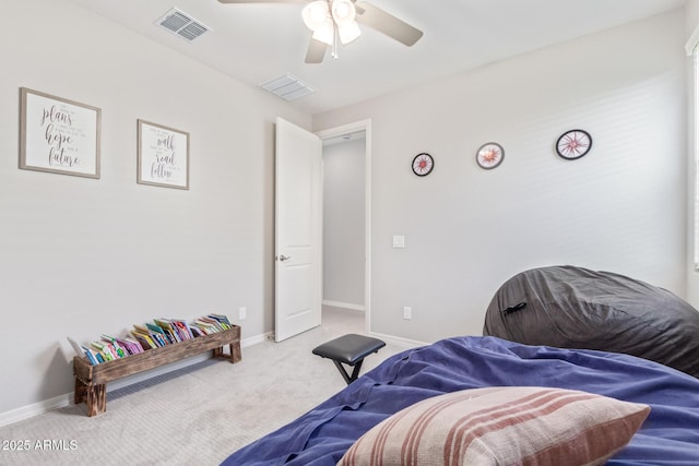 carpeted bedroom featuring baseboards, visible vents, and ceiling fan