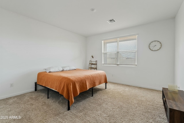 bedroom featuring light carpet