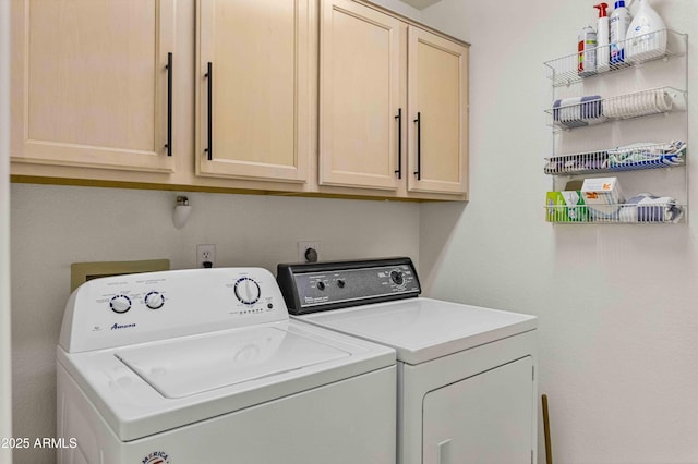 laundry area with cabinet space and washing machine and dryer